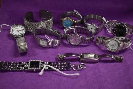 Ten silver tone ladies watches, including one Hammett.