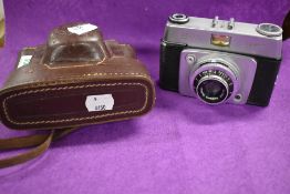 An Ilford Sportsman camera, with leather case