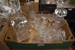 Two cut glass decanters marked Whisky and Sherry and a selection of glasses.
