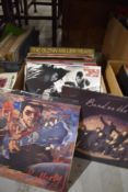A selection of LP records including Band on the Run-Wings, New Kids on the Block-Hangin' Tough,