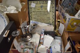 An eclectic lot comprising assorted stamps and coins, silver plated candelabra and brass candlestick