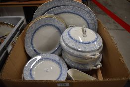An early 20th century Cameo pattern part dinner service including two tureens, two chargers, gravy