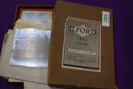 A selection of early 20th century photographic plate glass negatives