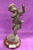 A Victorian French spelter figure of a boy chasing a bird 24cm tall AF