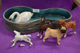 A Beswick swan and pool. Also included are a Beswick Pug, Boxer and two foals all AF