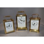 Three modern brass cased carriage clocks including Junghans and two by Estyma