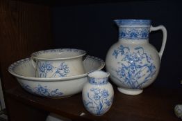 A Royal Doulton 'Daffodill' pattern four-piece toilet set, comprising wash jug, basin, chamber pot