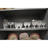 A suite of Waterford glass in the Colleen pattern including a set of six wine glasses, three large