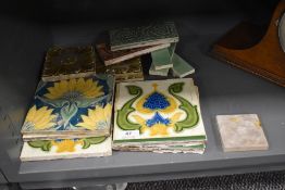 A selection of Victorian ceramic tiles including Brosoley
