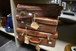 A group of three vintage cases,of small proportions, one leather (af) two card with wear.