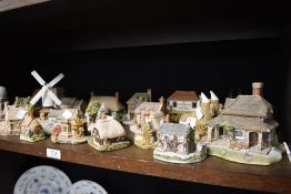 A collection of Lilliput Lane model cottages, twenty two in total