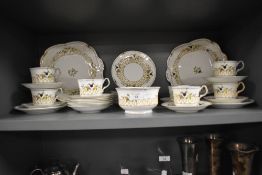 An Art Deco Collingwood part tea service having a printed and decorated floral pattern no 4634