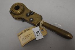 A vintage cast-brass ratchet 1/2' die thread cutter
