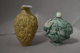 Two Chinese snuff bottles including stone carved and ceramic with 1000 faces design