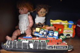 A small selection of Corgi and Lledo model vehicles, two composite dolls, two model canal barges and