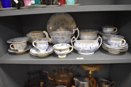 A Victorian porcelain part tea service in a traditional blue and white Willow ware style print