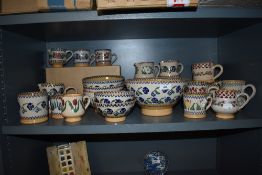 A selection of Irish Nicholas Mosse pottery sponge wares, to include various cups, jugs and bowls,