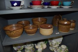 A group of Marris (Petershead) drip-glazed studio pottery wares, spouted bowls, salt kit, storage