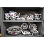 Two shelves of Losol Ware including biscuit barrels, wash bowl, graduated water jugs and dishes etc