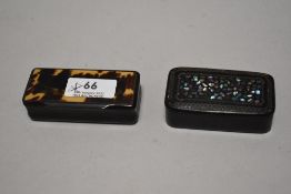 Two antique snuff cases or boxes including a carved horn and shell design and a micro mosaic