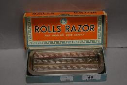 A vintage Rolls Razor, The World's Best Safely Razor, sold with original card outer packaging
