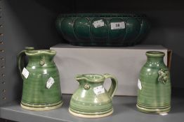 A Victorian green glaze fruit bowl with three pieces of modern studio pottery.
