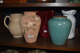 Four vintage ceramic vases including West German and Arthur Wood with a red glass glass