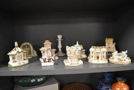 A set of nine Coalport miniature pastille burner cottages with some additional Coalport items
