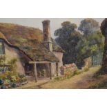 Lewis Mortimer, (19th/20th century), a watercolour, thatched country cottage, signed and dated 1920,