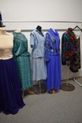 A selection of ladies 1970s and 80s clothing, including Louis Feraud dress and blouse in pale blue.