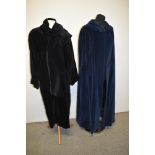 A vintage navy blue velvet cape and a black velvet Louis Feraud coat.