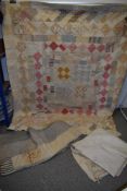 Three antique quilts, all with wear, for salvage or repurpose.