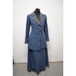 An Edwardian two piece ladies suit, comprising of jacket and skirt in teal blue having brocade