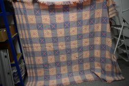 A 1960s pale pink and pale blue Welsh blanket, no label, AF, small hole.