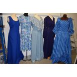 A selection of late 1960s to late 1970s dresses, including maxi dresses.