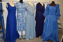 A selection of late 1960s to late 1970s dresses, including maxi dresses.