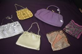 Four vintage hand bags including 1950s lilac leather clasp fastening bag, also included are two