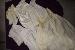 A mixed lot of Victorian and Edwardian babies clothing, some pretty details to many pieces.
