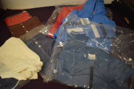 A collection of predominantly 1970s dead stock boys clothing, including underwear, coats and jeans.