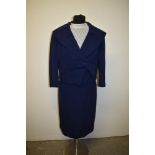 A late 1950s/ early 60s blue suit by Diane Warren, Blackpool, and a white blouse.