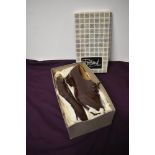 A pair of brown Portland shoes in box with stack heel, very little sign of wear, around a UK size 7,