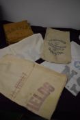 A large selection of vintage feed, sugar, flour and similar sacks, some Hessian, including Tate
