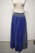 A Victorian royal blue skirt or petticoat having tie fastening to waist.