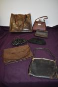 Seven early 20th to mid century handbags, various styles and sizes, including beaded and sequinned
