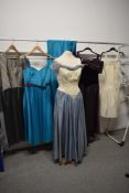 A selection of predominantly 1980s party and prom dresses.