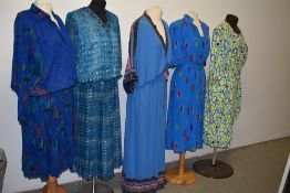 A collection of bright 1970s and 80s ladies clothing including Janice Wainwright maxi dress.