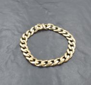 An Italian 9k gold curb link bracelet, with tongue and socket clasp, marked 375 & 9K alongside
