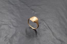 A gents gold signet ring,marks and monogram worn, size Y & approx 6.5g