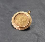 A Victorian sovereign, dated 1895, Sydney mint, all with a textured 9ct gold mount with