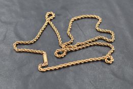 A yellow metal rope-twist chain, with socket clasp, unmarked, 11grams